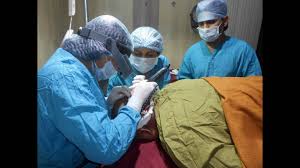 hair transplant surgeon team at work